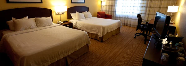 A nice hotel room interior with two beds — Stock Photo, Image