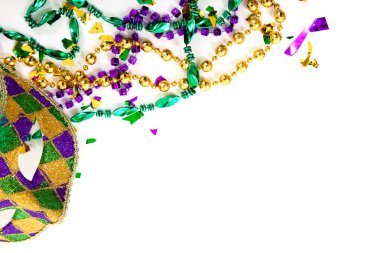 A Mardi gras mask and beads on a white background with copy spac clipart