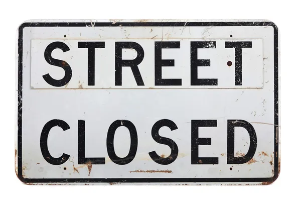 Un cartel de calle cerrado sobre un fondo blanco —  Fotos de Stock