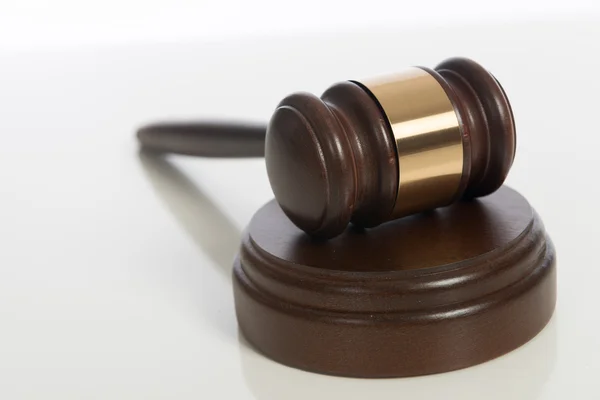 Wooden judge's gavel on white — Stock Photo, Image
