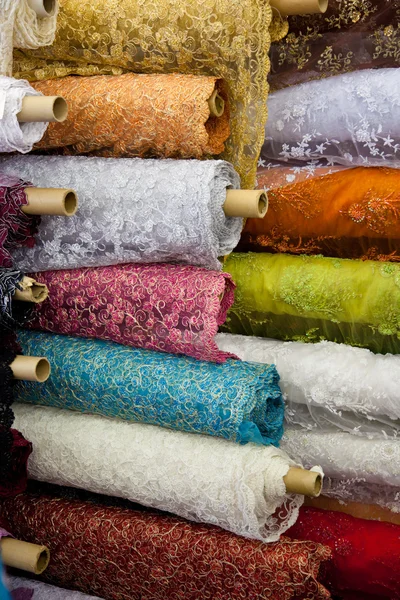 Bolt or rolls of various colored fabric — Stock Photo, Image
