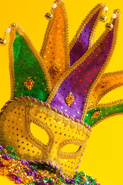 Colorful group of Mardi Gras or venetian mask or costumes on a y — Stock Photo, Image