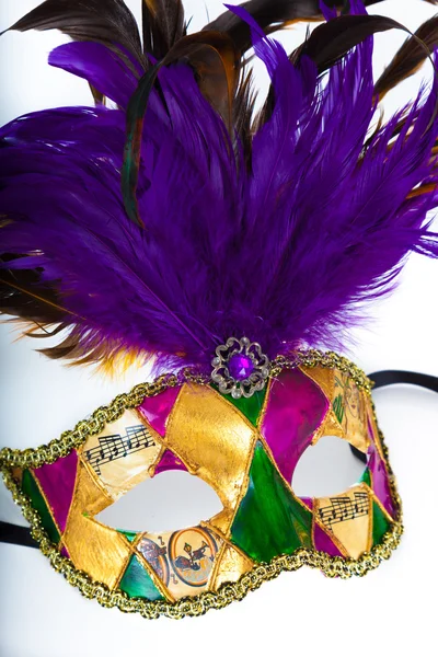 Een kleurrijke mardi gras of een Venetiaans masker op een witte achtergrond — Stockfoto