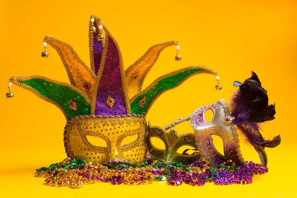 Colorful group of Mardi Gras or venetian mask or costumes on a y — Stock Photo, Image