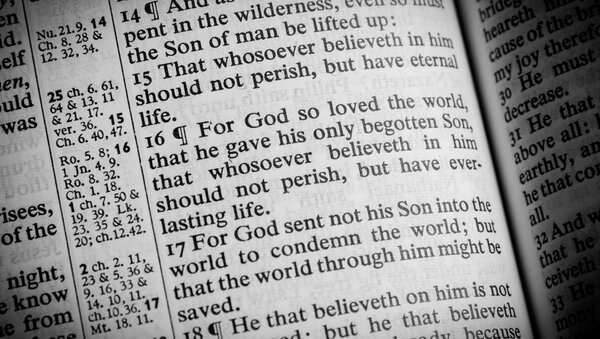 A Bible opened to John 3:16