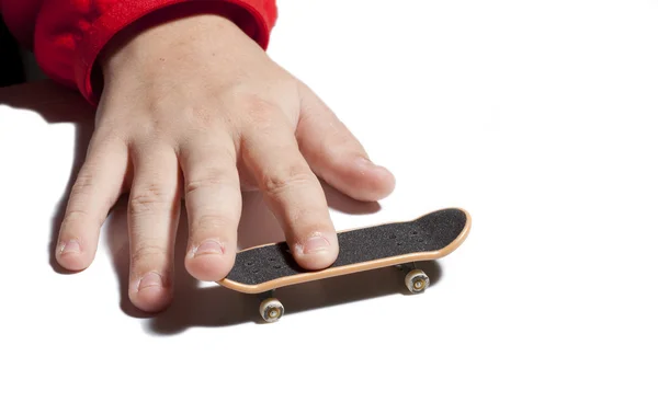 Kind mit seinem Skateboard — Stockfoto