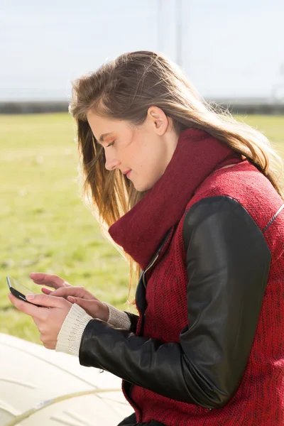 Young Girl with a tablet — Stock Photo, Image