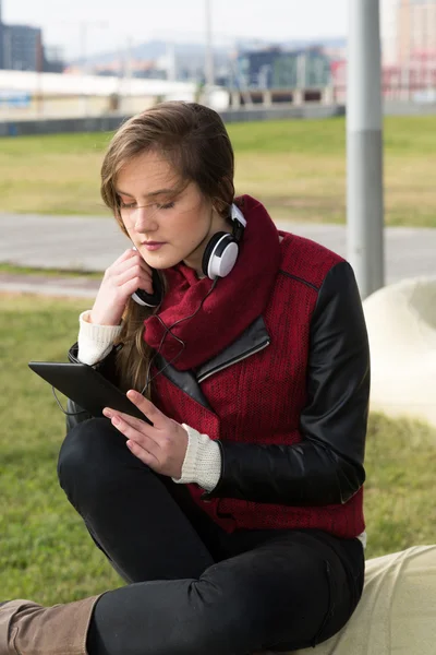 Young Girl with a tablet — Stock Photo, Image