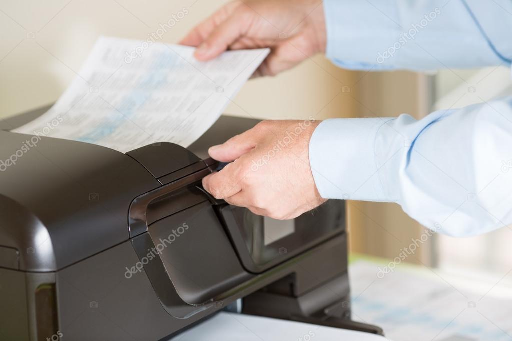 Man making a photocopy