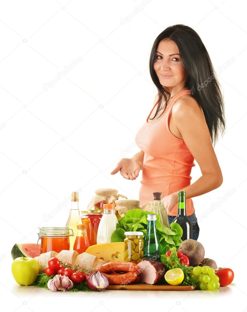 Young woman with variety of grocery products
