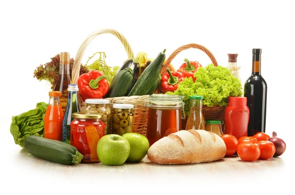 Composition with grocery products in shopping basket — Stock Photo, Image