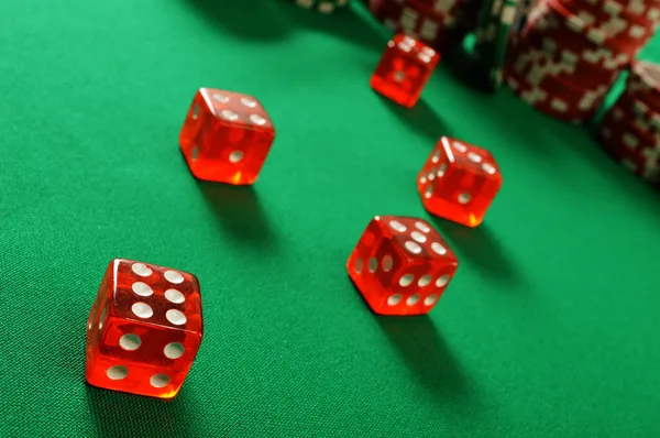 Composition with dices on green table — Stock Photo, Image