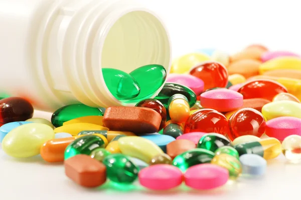 Composition with dietary supplement capsules and drug pills — Stock Photo, Image