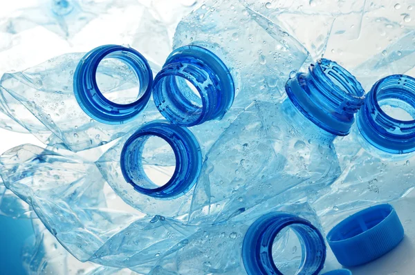 Composição com garrafas de plástico de policarbonato vazio de mineral — Fotografia de Stock