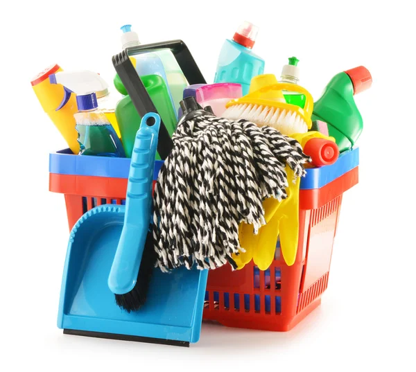 Shopping basket with detergent bottles isolated on white — Stock Photo, Image