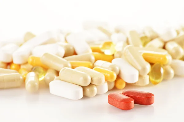 Composition with dietary supplement capsules. Drug pills Stock Picture