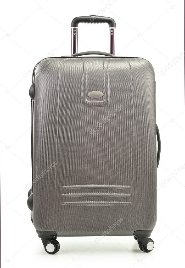 Large polycarboante suitcase isolated on white