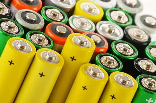 Composition with alkaline batteries. Chemical waste — Stock Photo, Image