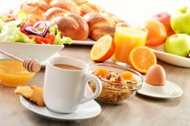 kahvaltı kahve, ekmek, bal, portakal suyu, müsli de dahil olmak üzere bir