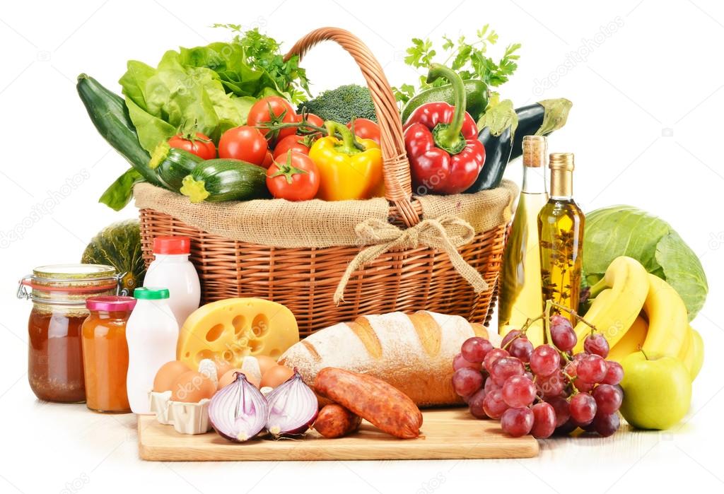 Assorted grocery products including vegetables fruits wine bread dairy and meat isolated on white