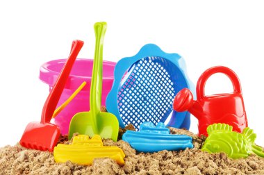 sandpit ve bir plajda çalıştırmak için plastik çocuk oyuncakları