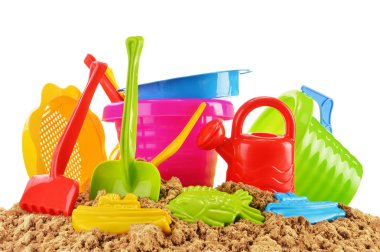 sandpit ve bir plajda çalıştırmak için plastik çocuk oyuncakları
