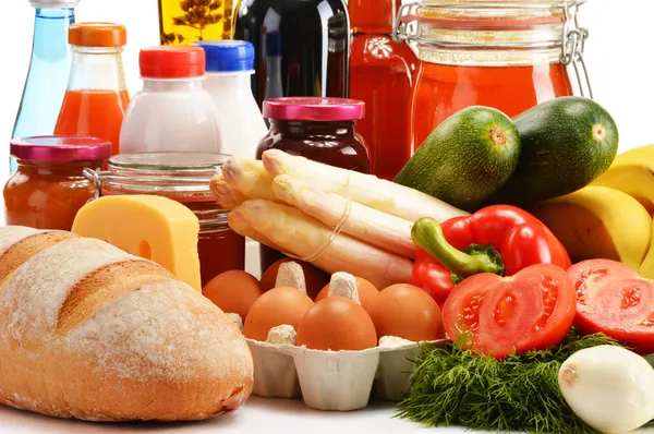 Composition with variety of grocery products on white — Stock Photo, Image