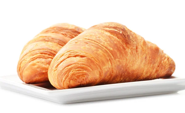 Croissant freschi isolati su fondo bianco — Foto Stock