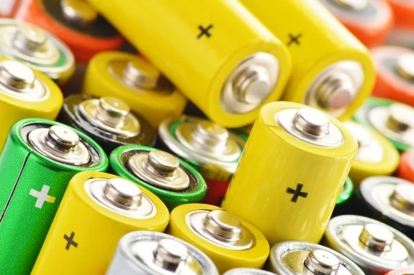 Composition with alkaline batteries. Chemical waste — Stock Photo, Image