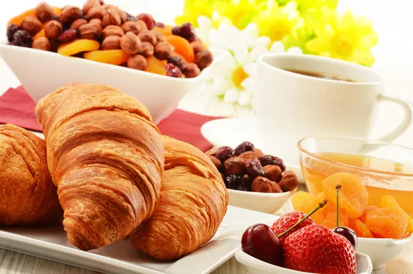 Breakfast with croissants cup of coffee and fruits — Stock Photo, Image