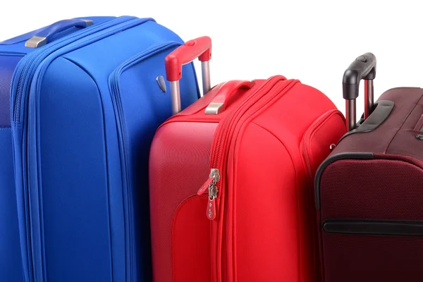 흰색 위에 따로 떼어 놓은 커다란 여행 가방으로 이루어진 가방들 — 스톡 사진