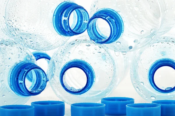Composição com garrafas de plástico de policarbonato vazio de mineral — Fotografia de Stock