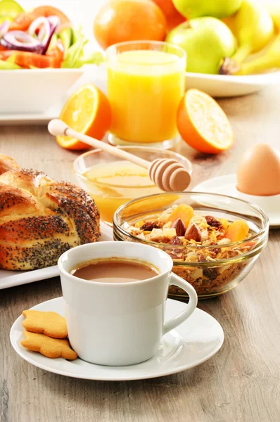 Breakfast including coffee, bread, honey, orange juice, muesli a — Stock Photo, Image