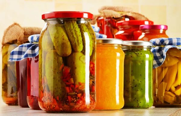 Composition with jars of pickled vegetables. Marinated food — Stock Photo, Image