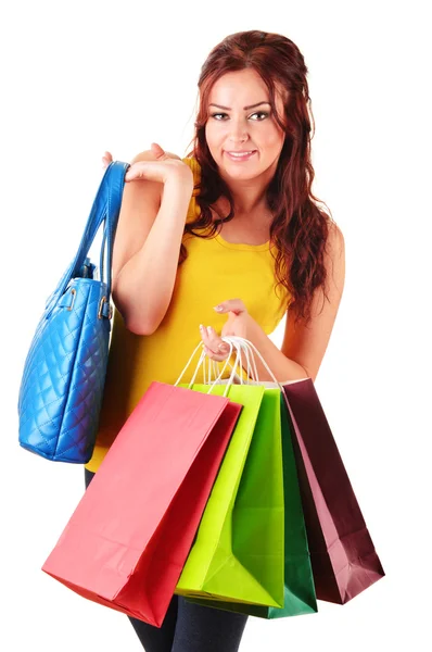하얀 위에 쇼핑백을 단 젊은 여자 — 스톡 사진