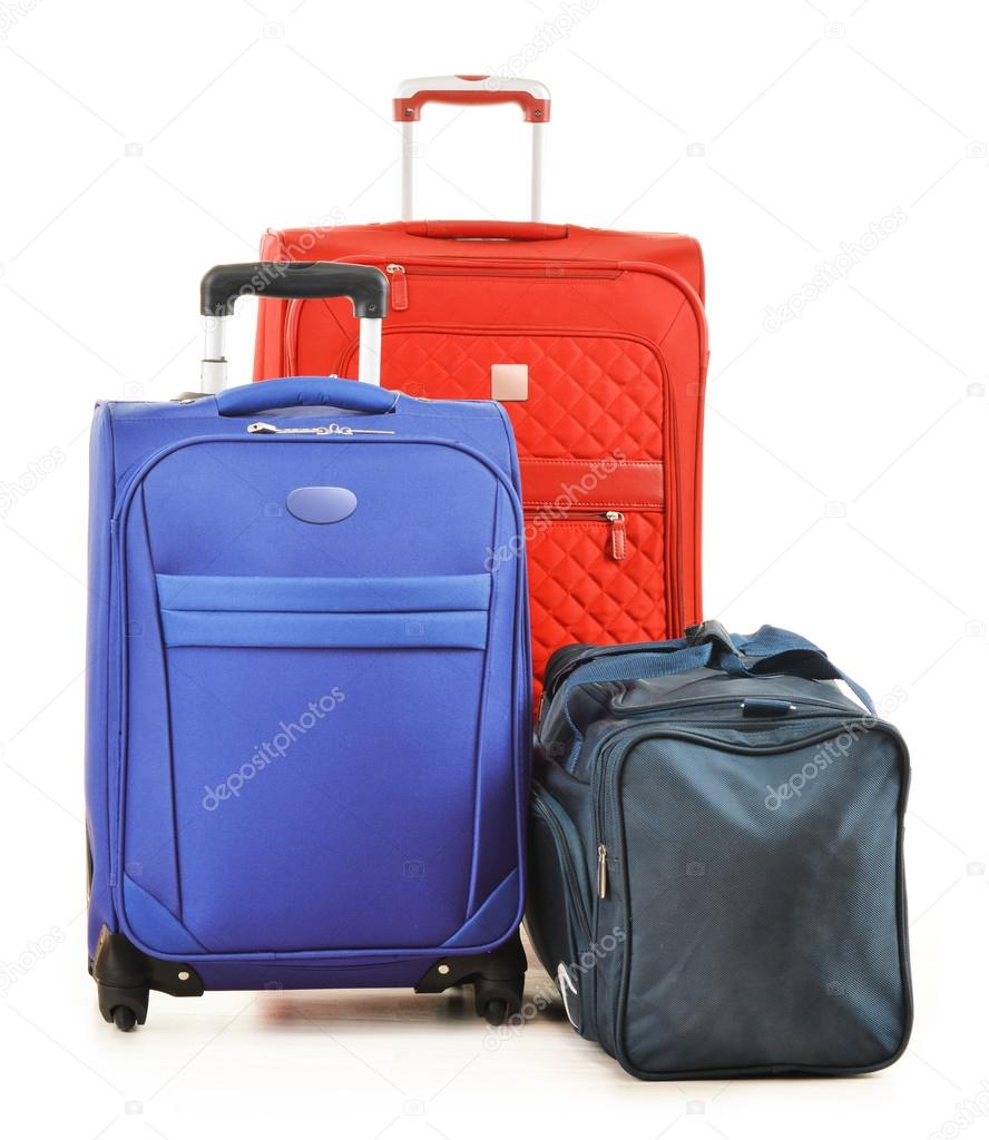 Luggage consisting of large suitcases and travel bag on white