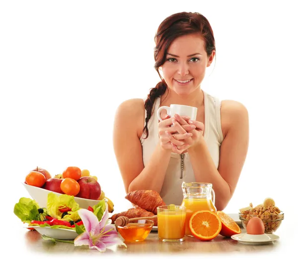 Mujer joven desayunando. Dieta equilibrada —  Fotos de Stock