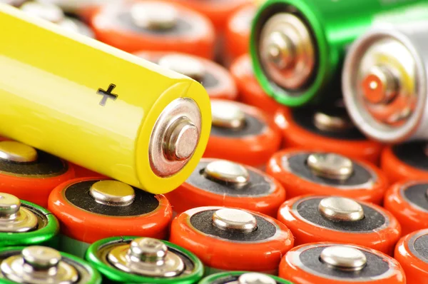 Composition with alkaline batteries. Chemical waste — Stock Photo, Image