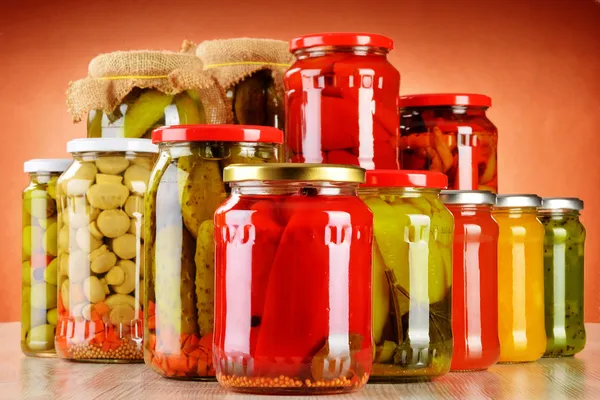 Composition with jars of pickled vegetables. Marinated food — Stock Photo, Image
