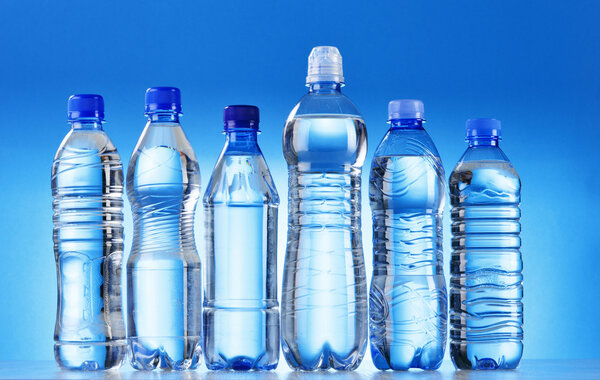 Composition with assorted plastic bottles of mineral water