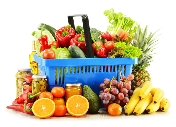 Plastic shopping basket with groceries isolated on white — Stock Photo, Image