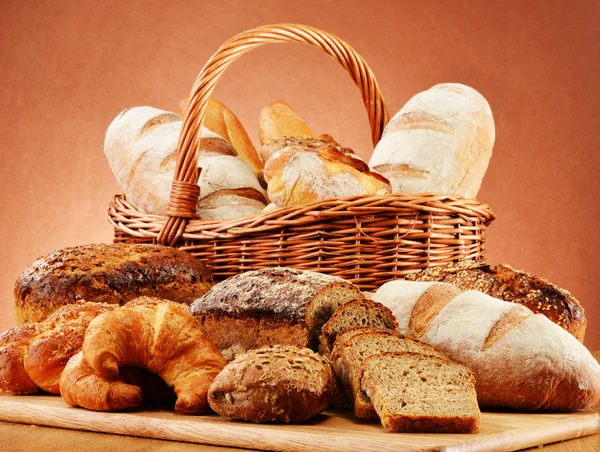Wicker basket with variety of baking products — Stock Photo, Image