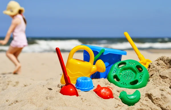 Plastic children toys on the sand beach — Stock Photo, Image