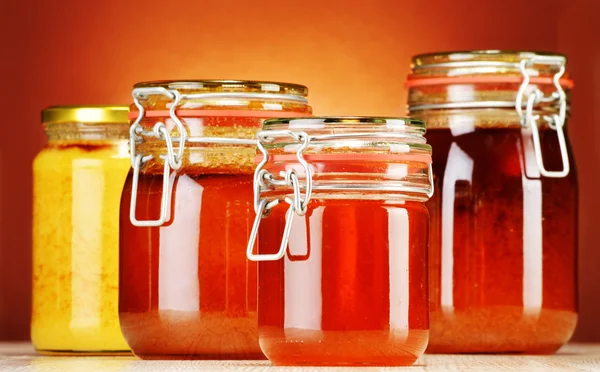 Composition with jars of honey — Stock Photo, Image