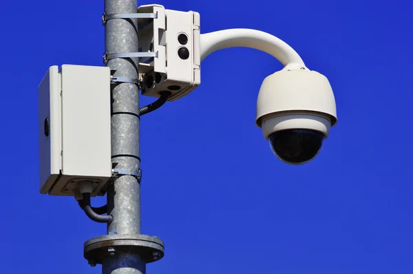 Hi-tech dome type camera over blue sky — Stock Photo, Image