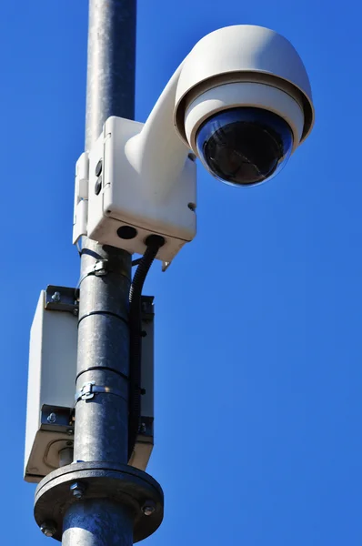 Hi-tech dome type camera over blue sky — Stock Photo, Image