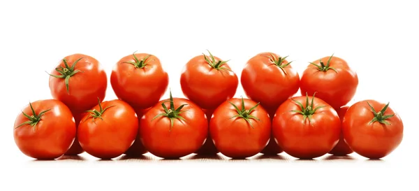 Samenstelling met biologische tomaten op geïsoleerde op wit — Stockfoto