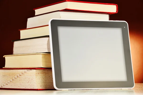 Composition with books and tablet computer on the table — Stock Photo, Image