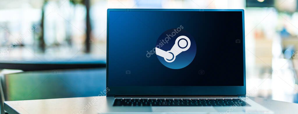 POZNAN, POL - SEP 23, 2020: Laptop computer displaying logo of Steam, a video game digital distribution service by Valve