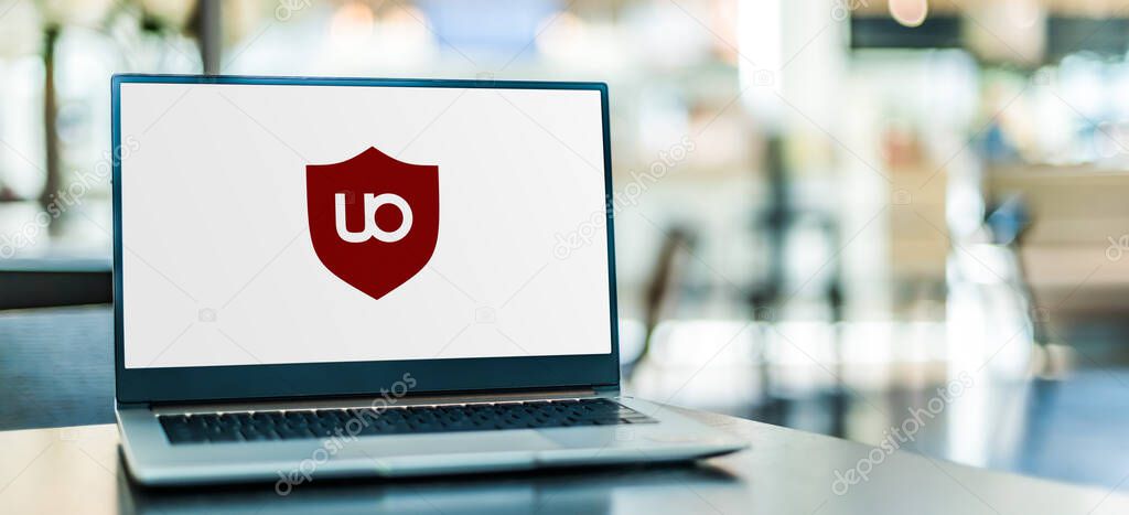 POZNAN, POL - APR 15, 2021: Laptop computer displaying logo of uBlock Origin, a free and open-source, cross-platform browser extension for content-filtering, including ad-blocking